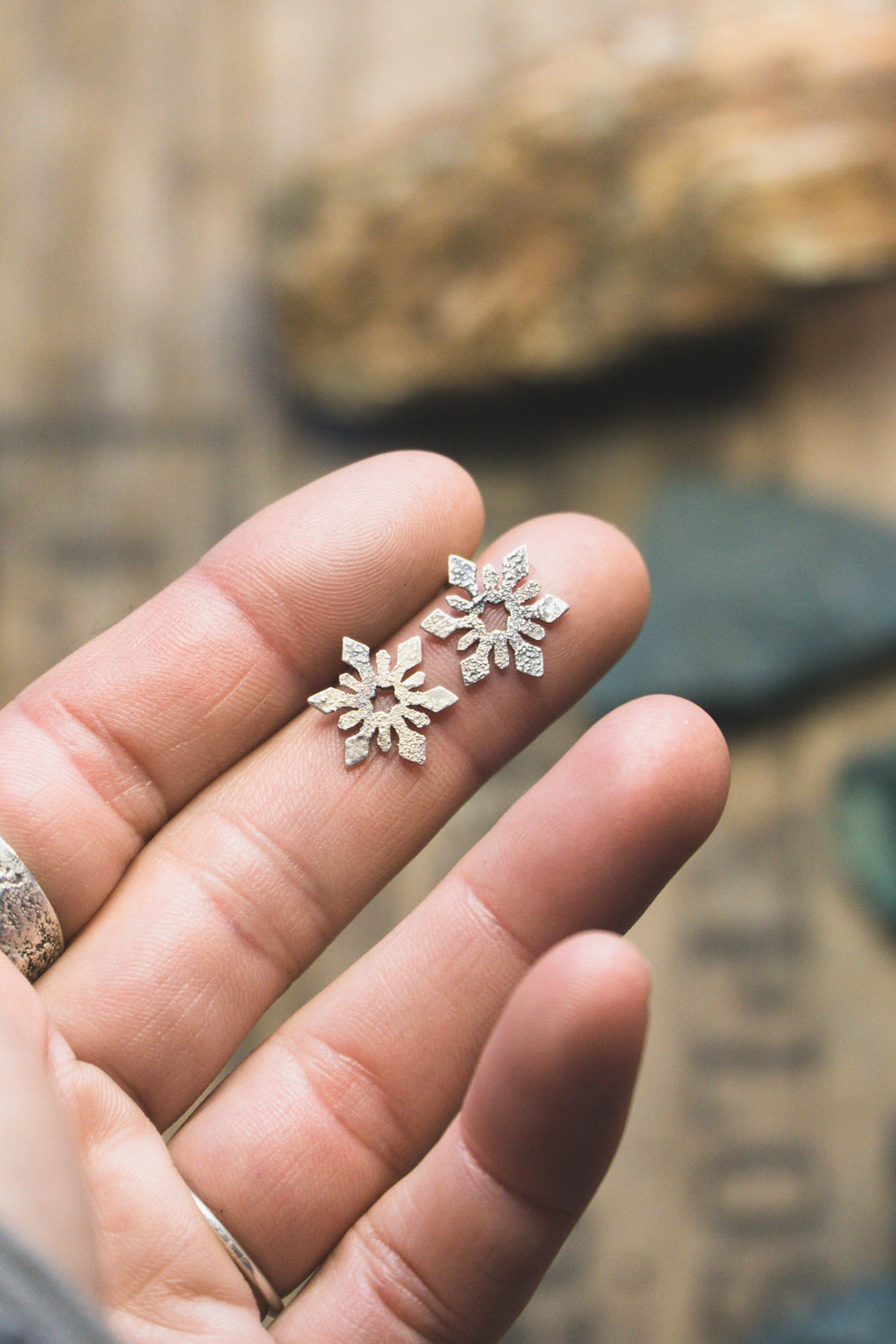 Small snowflake stud earrings